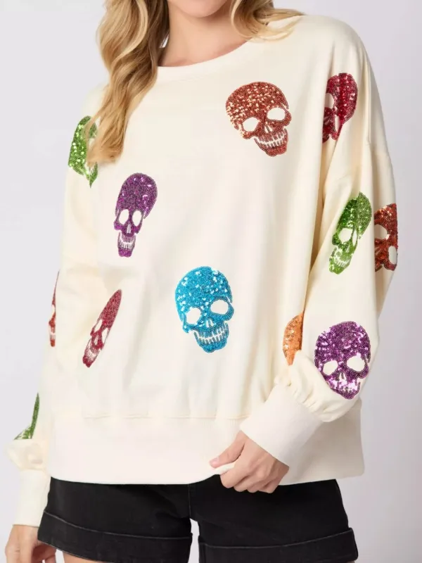 Halloween Colorful Skull Sequin Oversized Sweatshirt sold by Charming Charlie