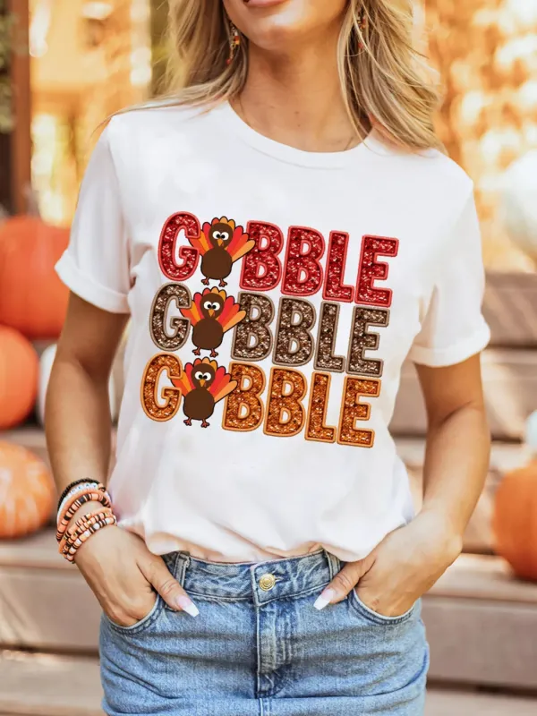 GOBBLE Thanksgiving Turkey Print T Shirt sold by Charming Charlie