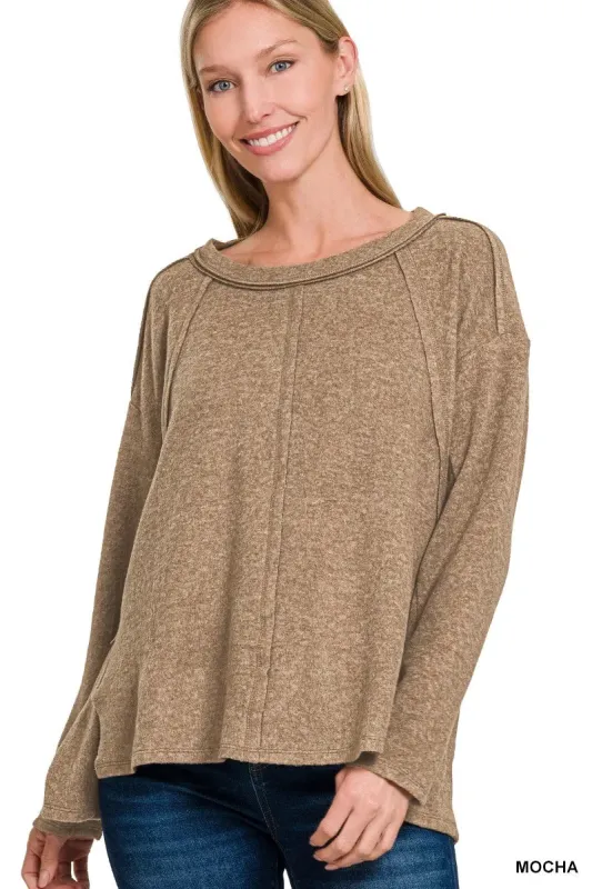 Zenana Brushed Hacci Exposed Seam Hi Low Sweater sold by Charming Charlie