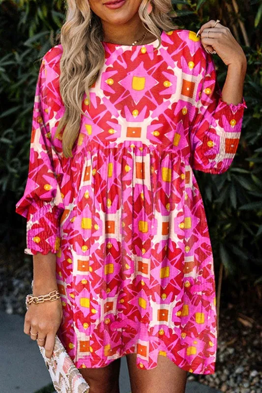Geometric Print Smocked Long Sleeve Mini Dress sold by Charming Charlie