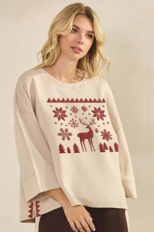 Reindeer in the Snow UltraComfy Embroidered Top sold by Charming Charlie