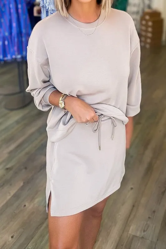 Solid Drop Shoulder Pullover and Mini Skirt Set sold by Charming Charlie