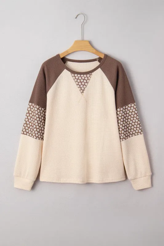 Floral Patchwork Colorblock Raglan Long Sleeve Top sold by Charming Charlie