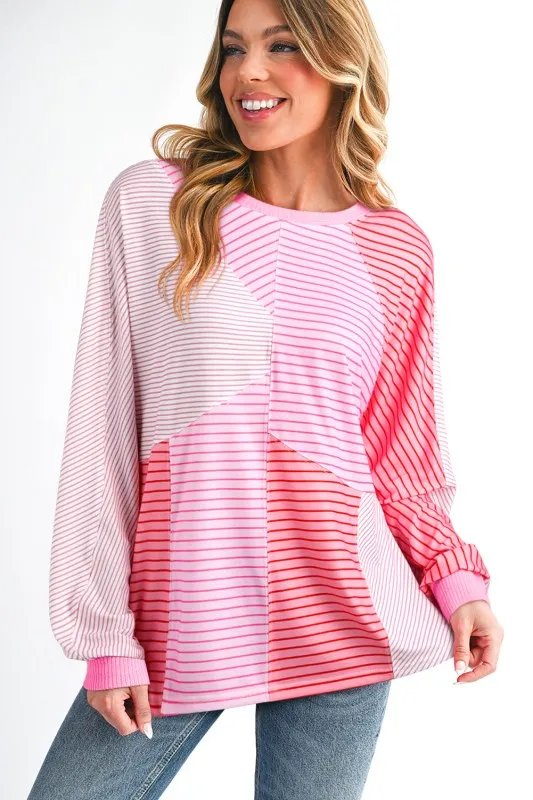 Stripe Colorblock Reverse Seam Long Sleeve Top sold by Charming Charlie