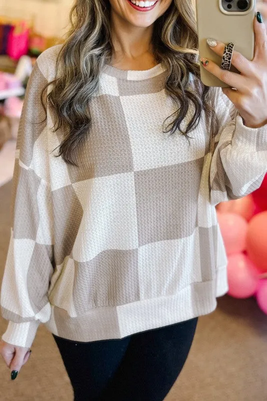 Checker Waffle Knit Long Sleeve Top sold by Charming Charlie