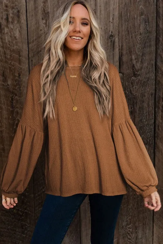 Faux Knit Jacquard Puffy Long Sleeve Top sold by Charming Charlie