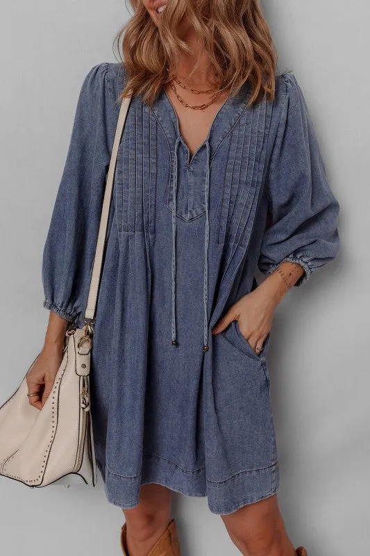 Denim 3/4 Sleeve Tied V-Neck Pleated Mini Dress sold by Charming Charlie