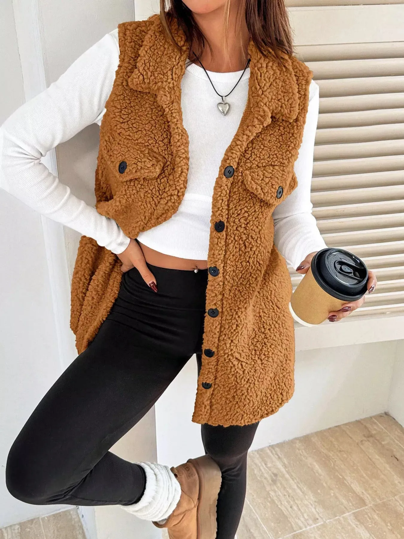 Button-Down Sherpa Fleece Vest Coat sold by Charming Charlie