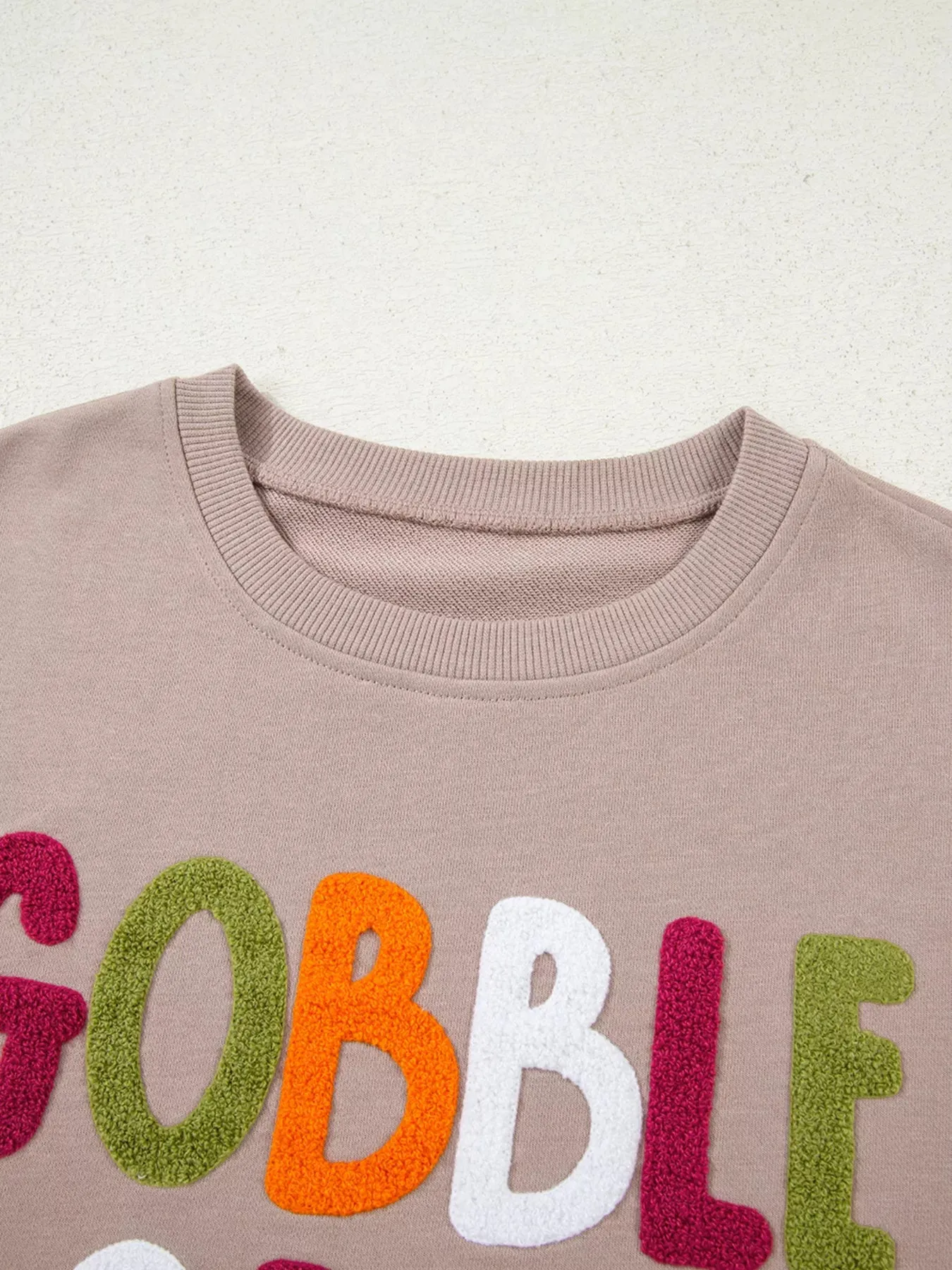GOBBLE Letter Graphic Thanksgiving Shift Sweatshirt sold by Charming Charlie product image thumbnail 4