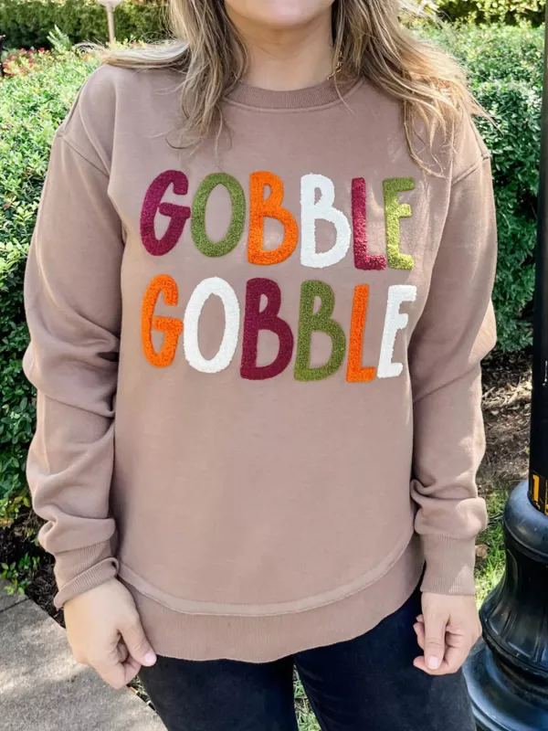 GOBBLE Letter Graphic Thanksgiving Shift Sweatshirt sold by Charming Charlie