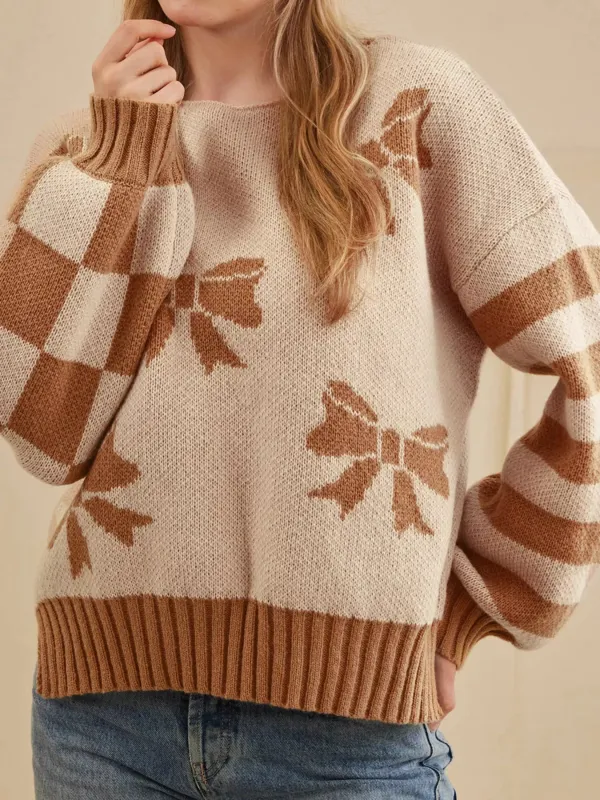 Ribbon Bow Checkered Striped Sleeve Drop Shoulder Sweater sold by Charming Charlie