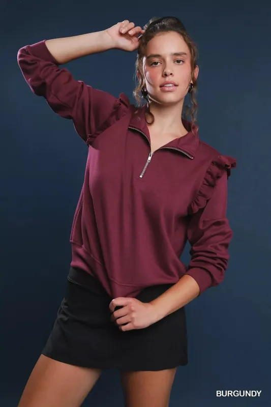 Umgee Luxeknit Ruffle Shoulder Quarter-Zip Sweatshirt sold by Charming Charlie