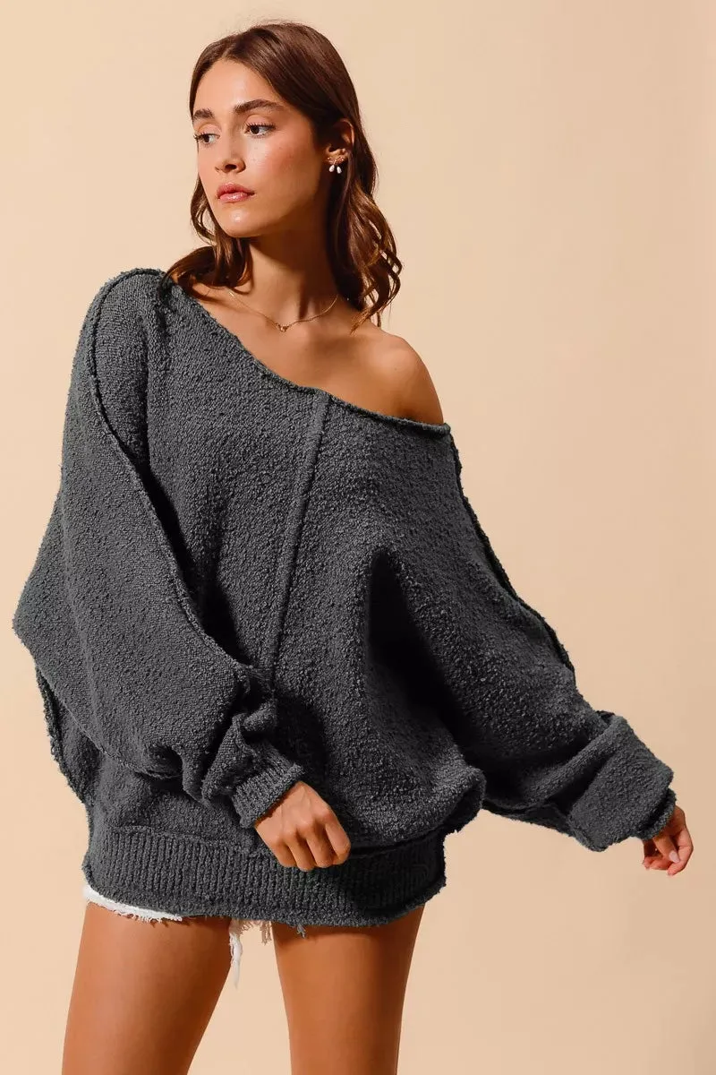 SO ME Loose Fit Exposed Seam Slouchy Boucle Sweater sold by Charming Charlie