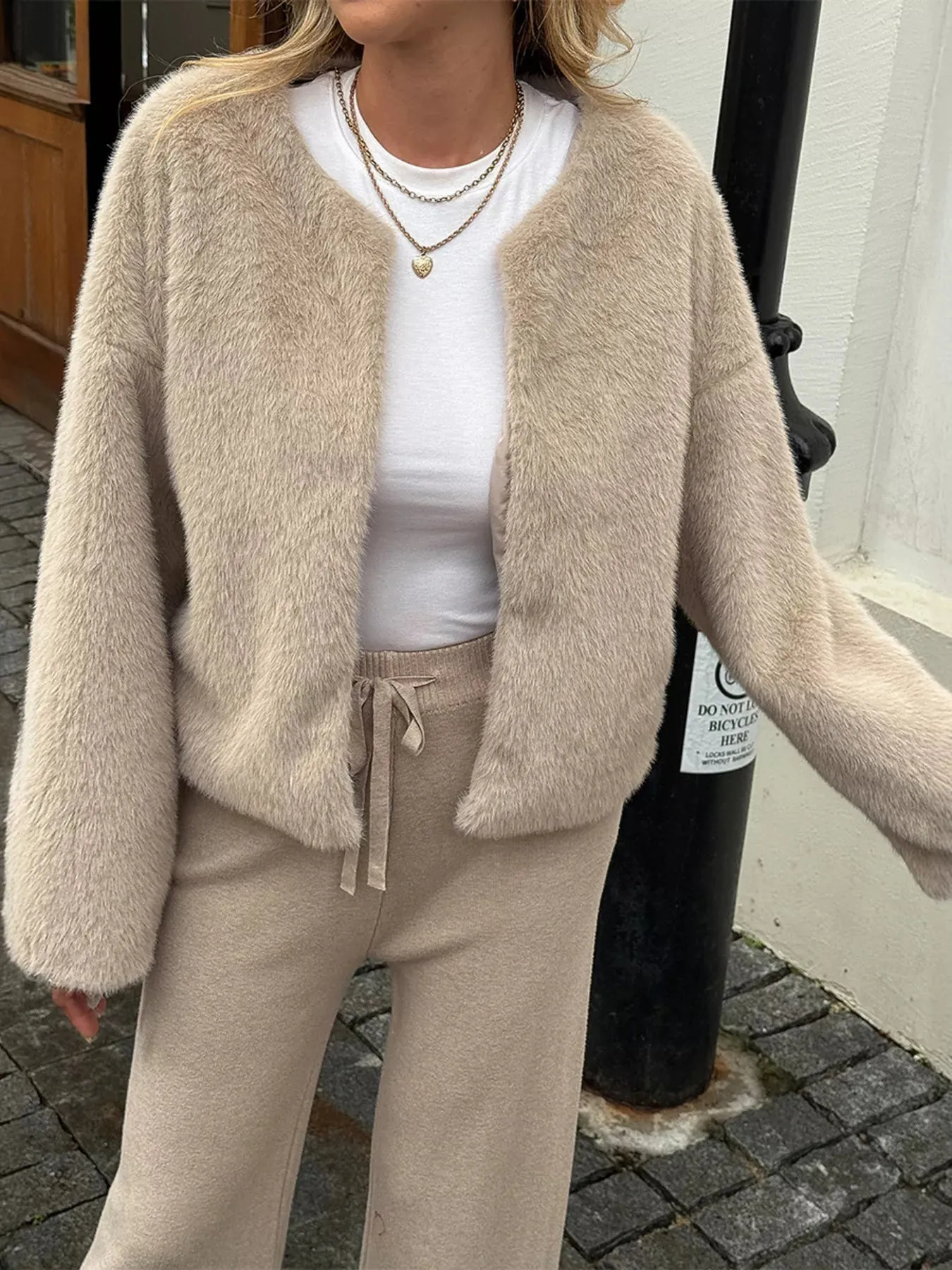 Open Front Dropped Shoulder Fuzzy Outerwear sold by Charming Charlie