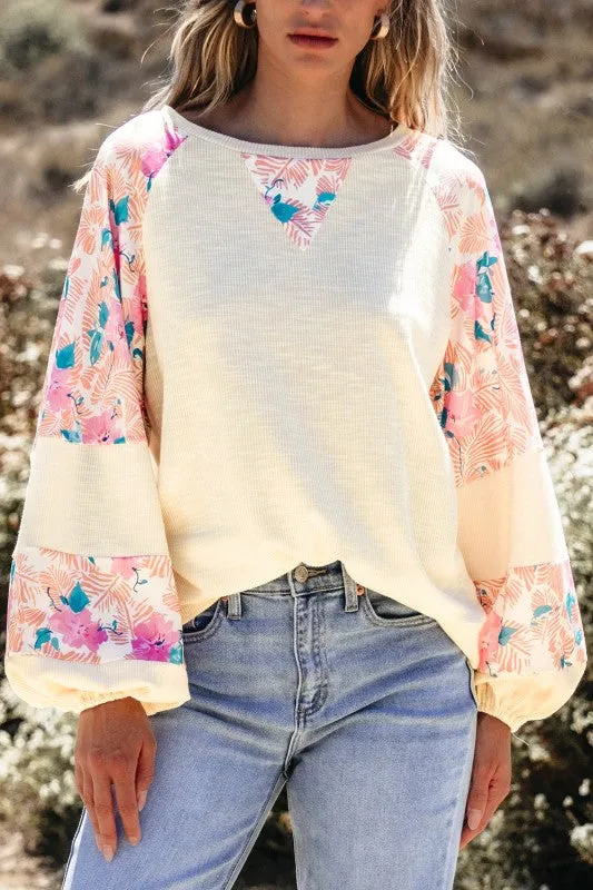 Floral Patchwork Balloon Sleeve Textured Blouse sold by Charming Charlie