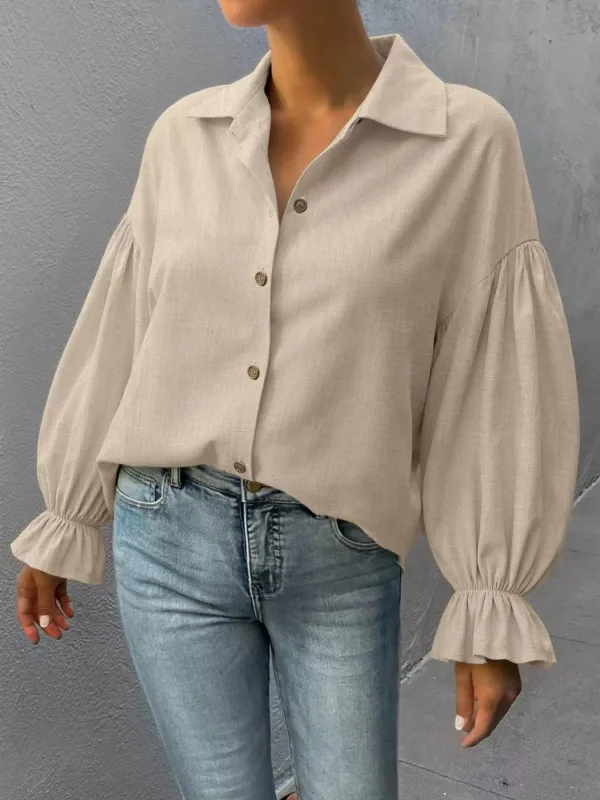 Button-Down Flounce Sleeve Shirt sold by Charming Charlie