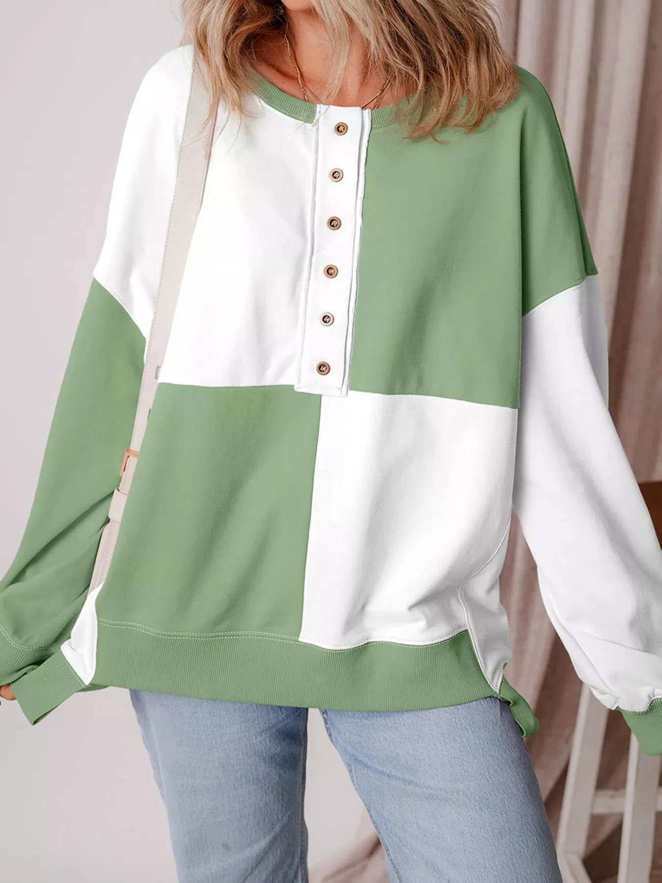 Colorblock Henley High Low Oversize Sweatshirt sold by Charming Charlie