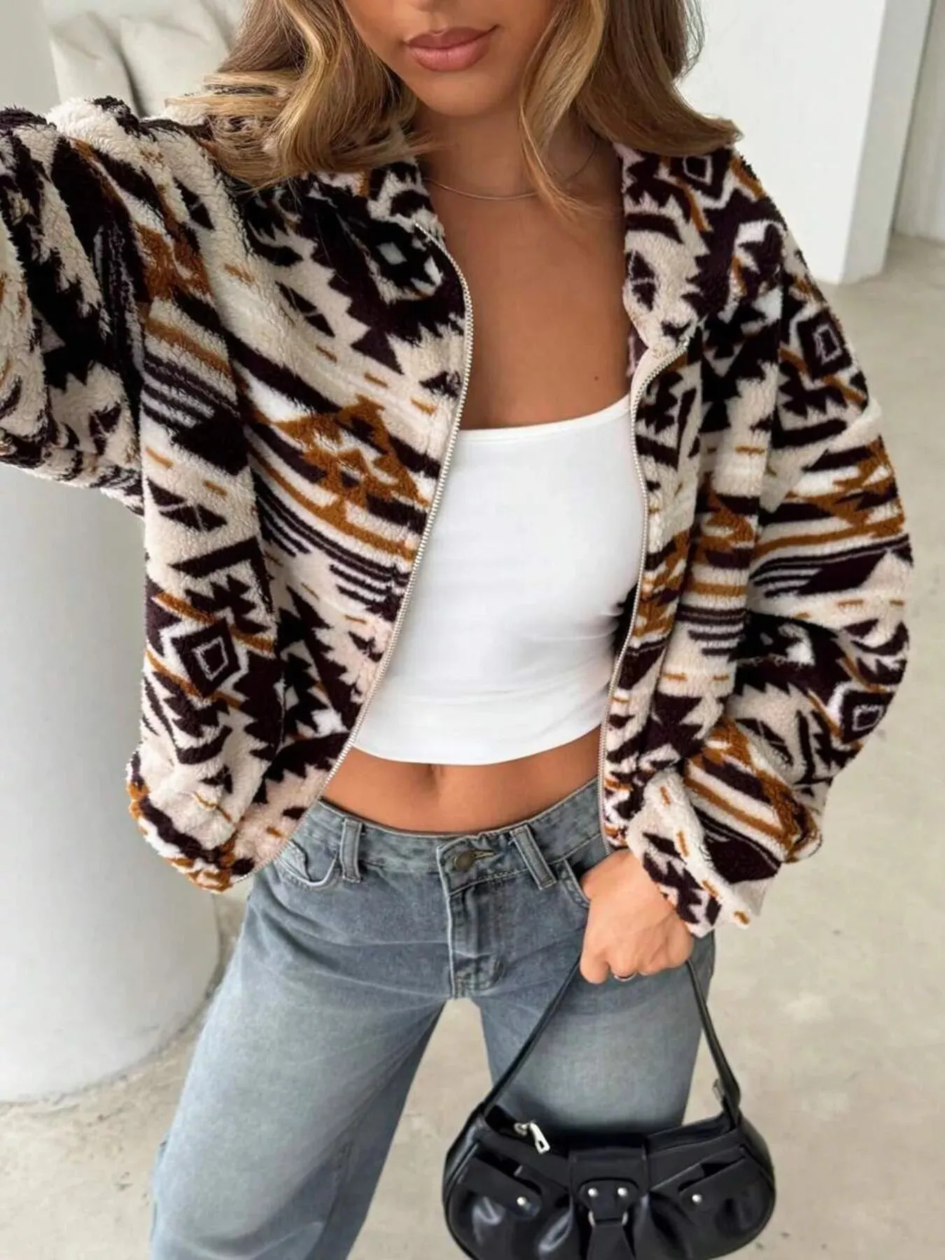 Geometric Fleece Zip-Up Jacket sold by Charming Charlie