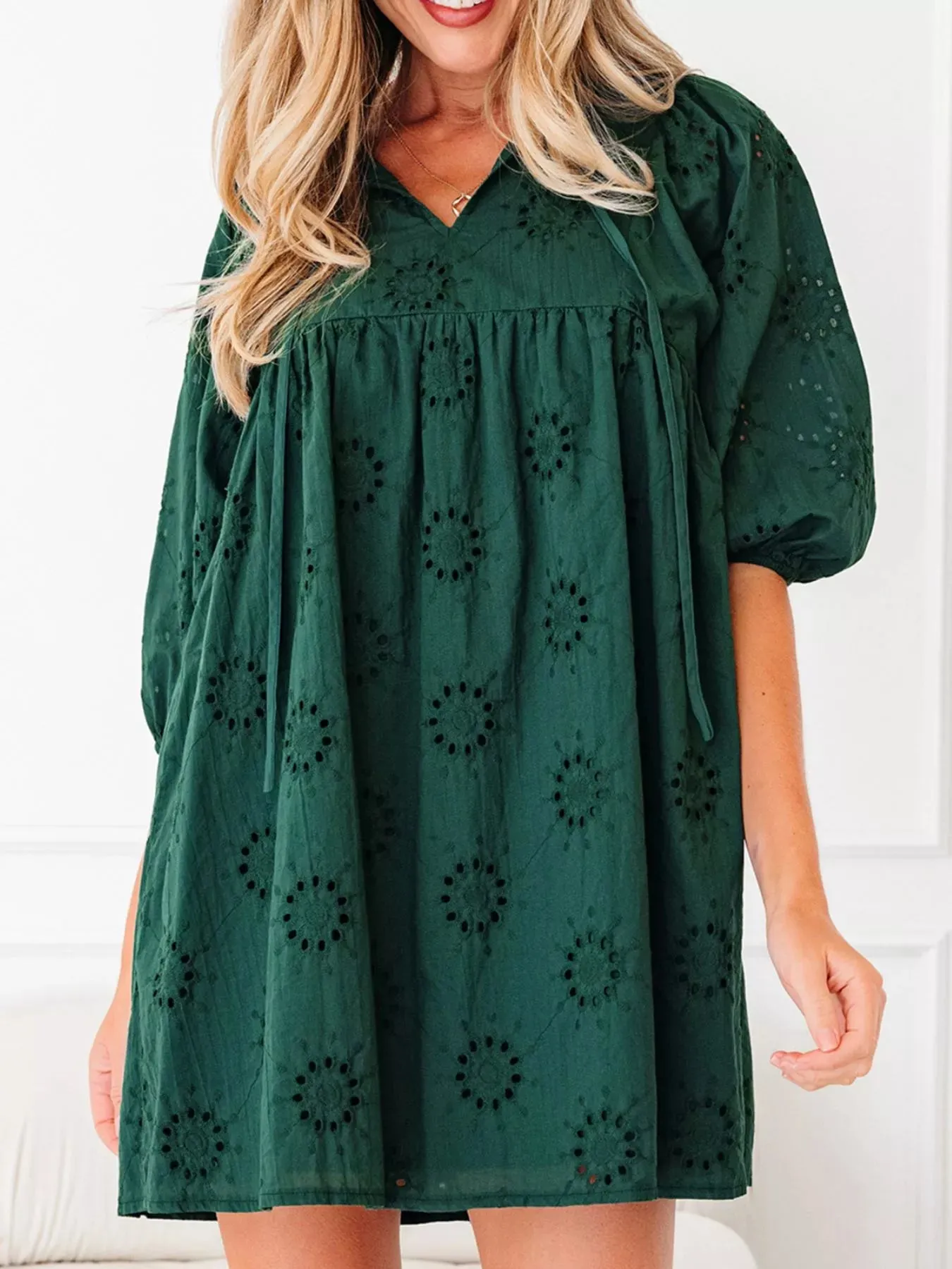 Embroidered Eyelet Pattern 3/4 Puffy Sleeve Swing Mini Dress sold by Charming Charlie product image thumbnail 4