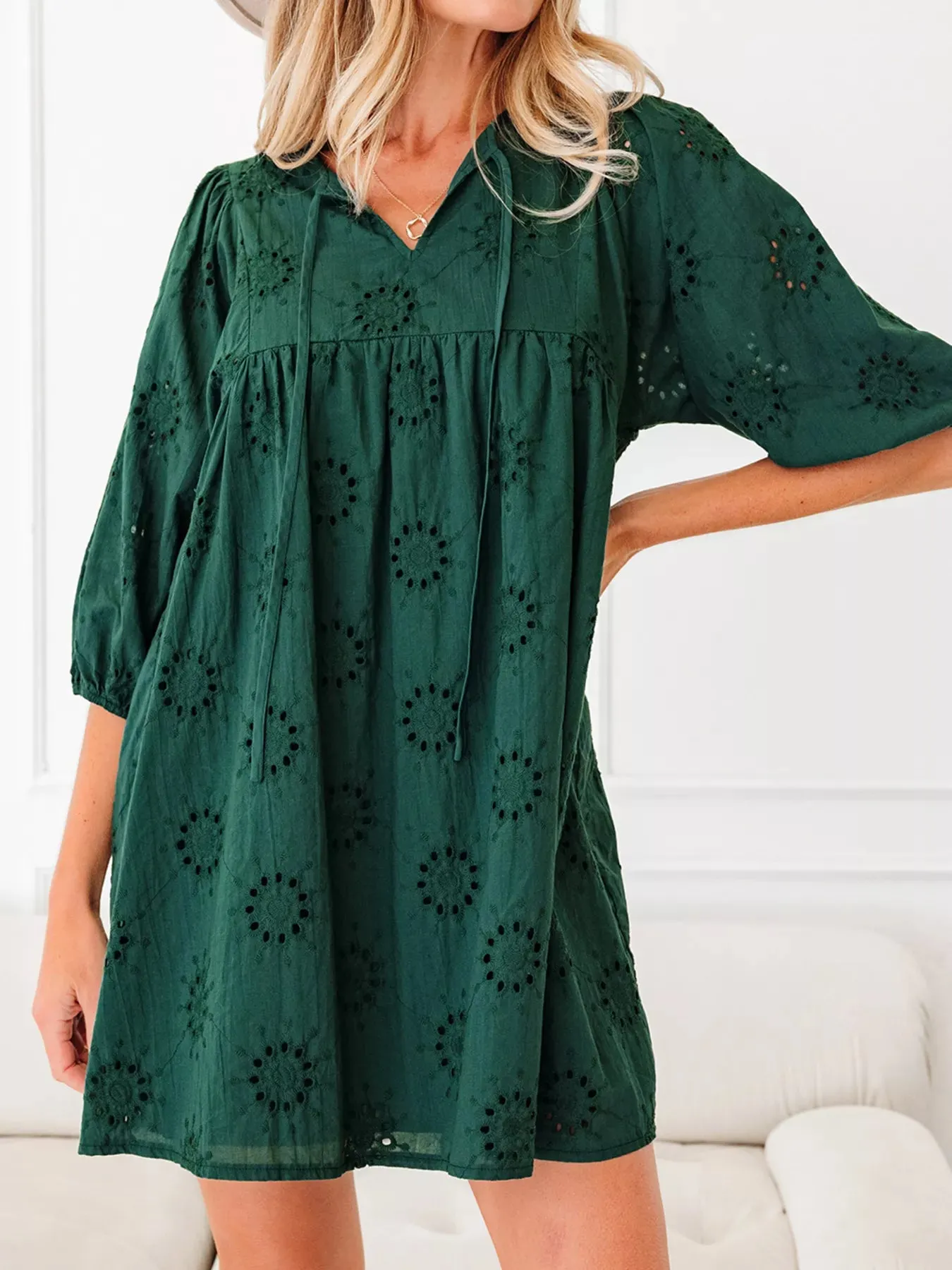 Embroidered Eyelet Pattern 3/4 Puffy Sleeve Swing Mini Dress sold by Charming Charlie