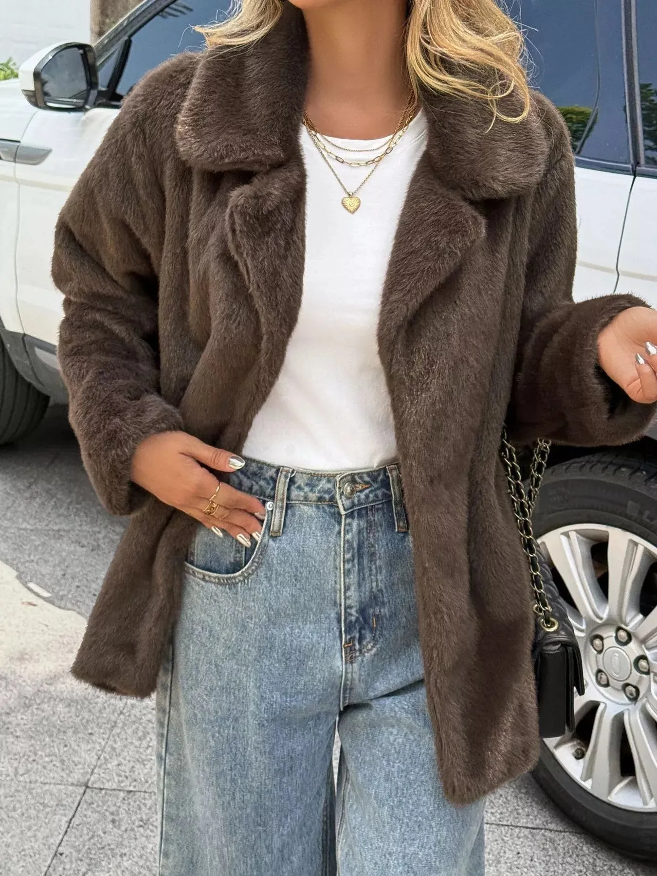 Faux Fur Button Up Outerwear sold by Charming Charlie