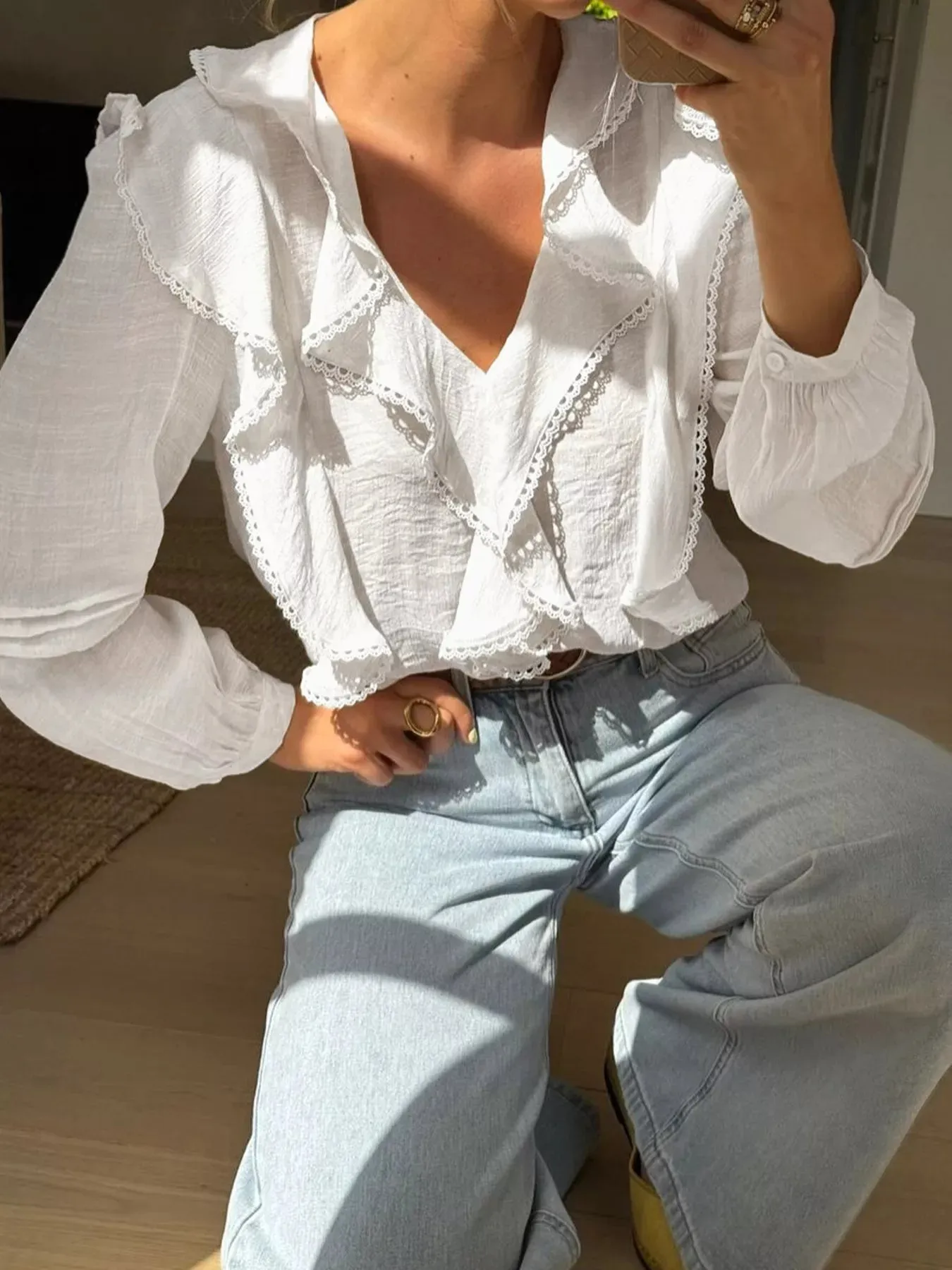 Ruffle Trim V-Neck Blouse sold by Charming Charlie
