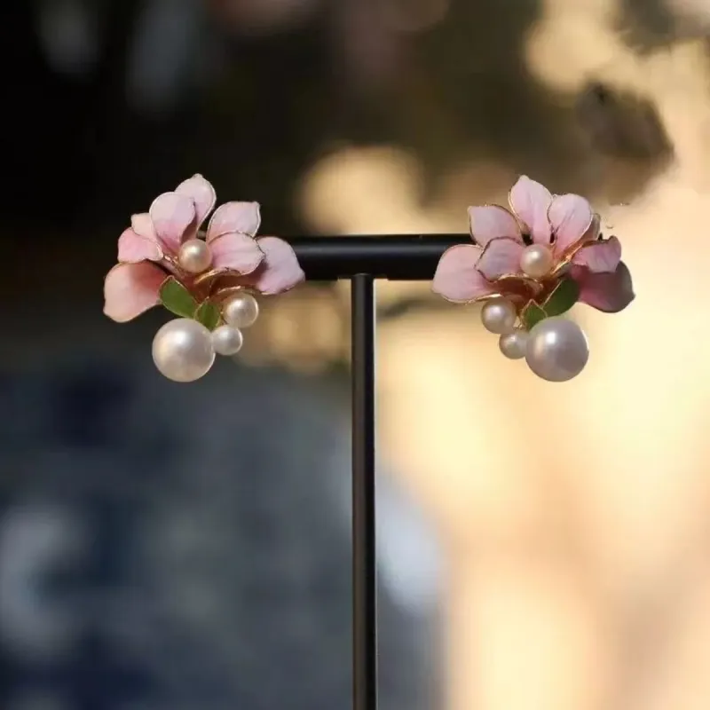 Flower Pearl Stud Earrings sold by Charming Charlie