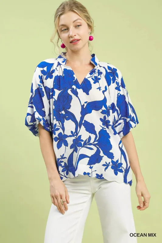 Umgee Floral Print Puff Sleeve Blouse with Scallop Hem sold by Charming Charlie