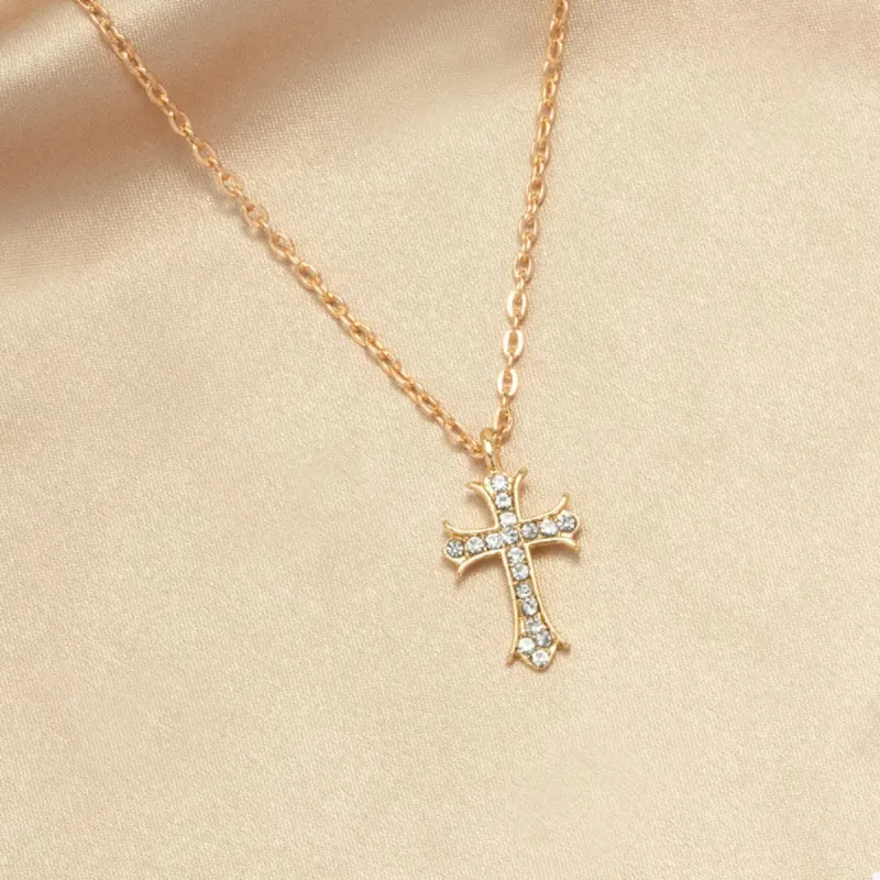 18K Gold-Plated Rhinestone Cross Necklace sold by Charming Charlie