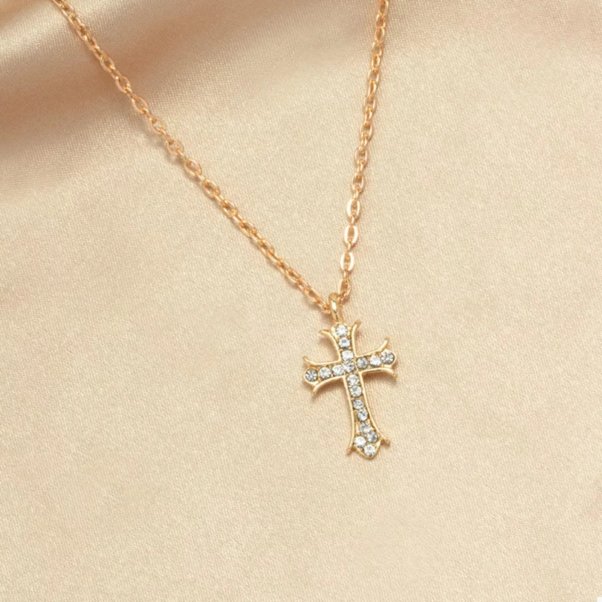 18K Gold-Plated Rhinestone Cross Necklace sold by Charming Charlie