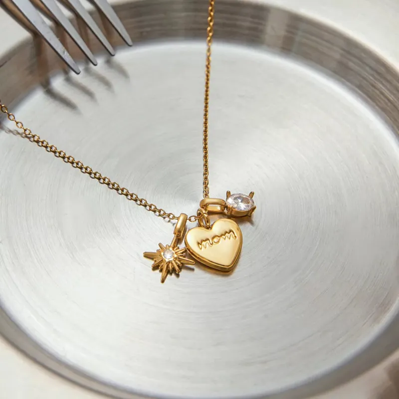 18K Gold-Plated 'Mom' Heart Necklace sold by Charming Charlie