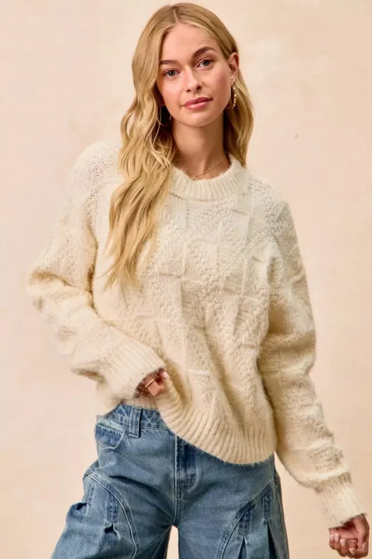 BiBi Checker Board Drop Shoulder Sweater sold by Charming Charlie