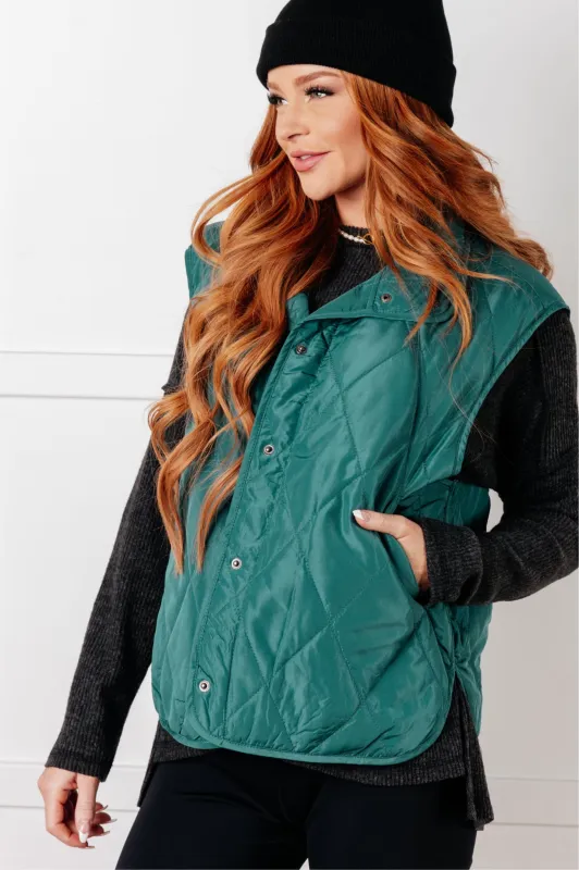 Layering Queen Quilted Puffer Vest in Hunter Green sold by Charming Charlie