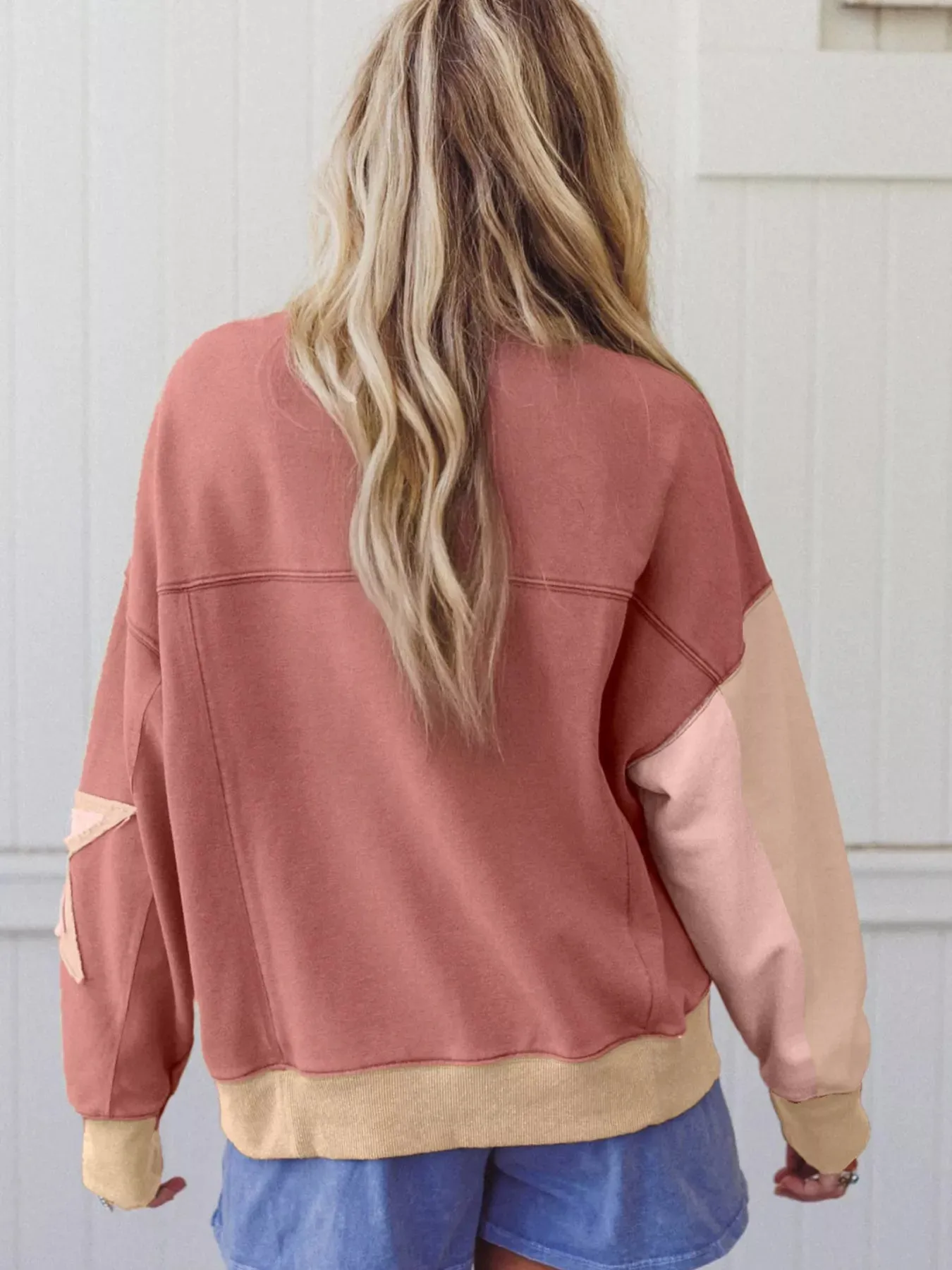 Contrast Star Patchwork Exposed Seam Uneven Hem Drop Shoulder Sweatshirt sold by Charming Charlie product image thumbnail 2