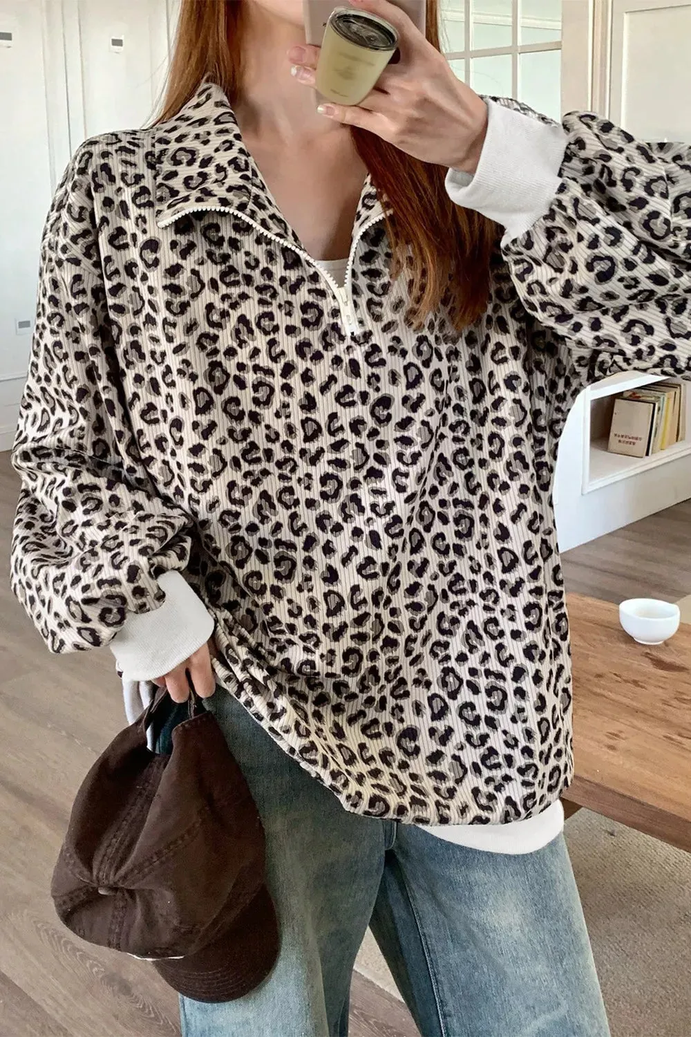 Leopard Print Quarter-Zip Sweatshirt sold by Charming Charlie