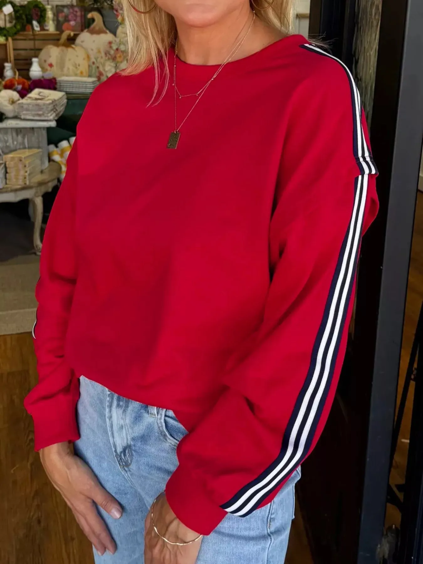 Contrast Striped Detail Varsity Sweatshirt sold by Charming Charlie