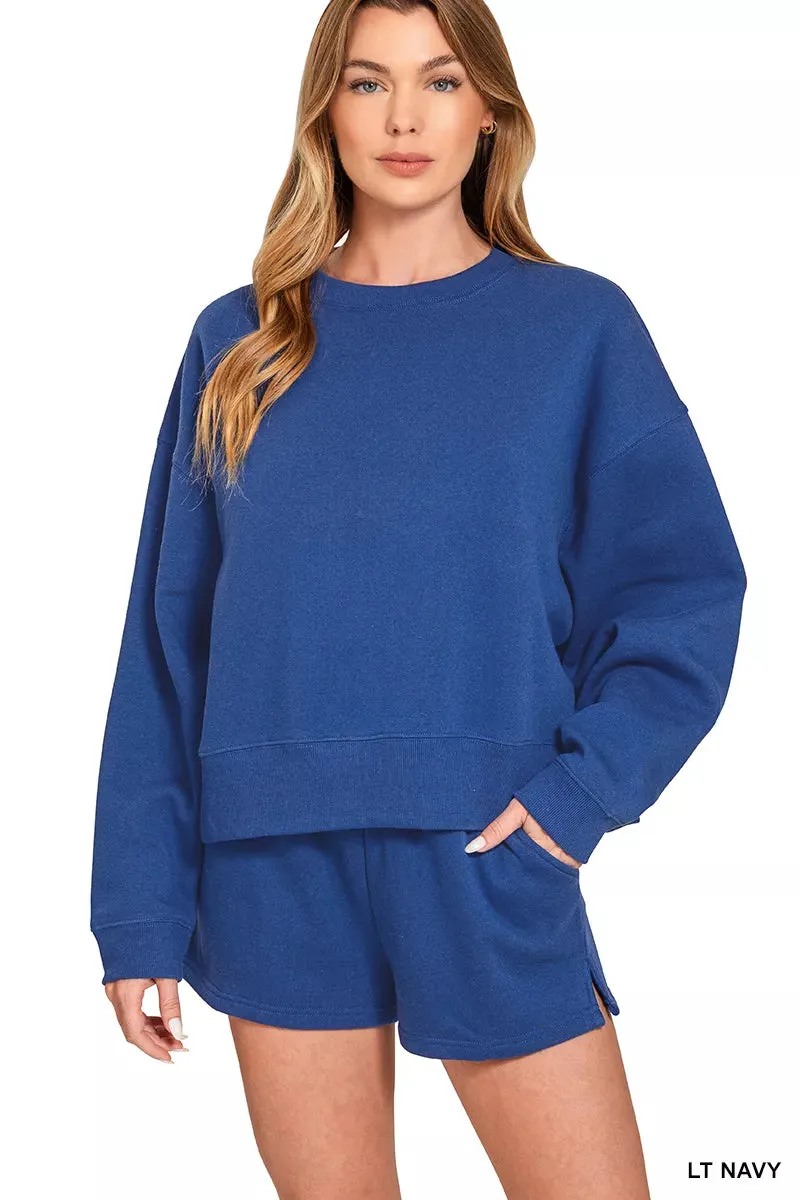 Zenana Fleece Round Neck Sweatshirt and Shorts Set sold by Charming Charlie