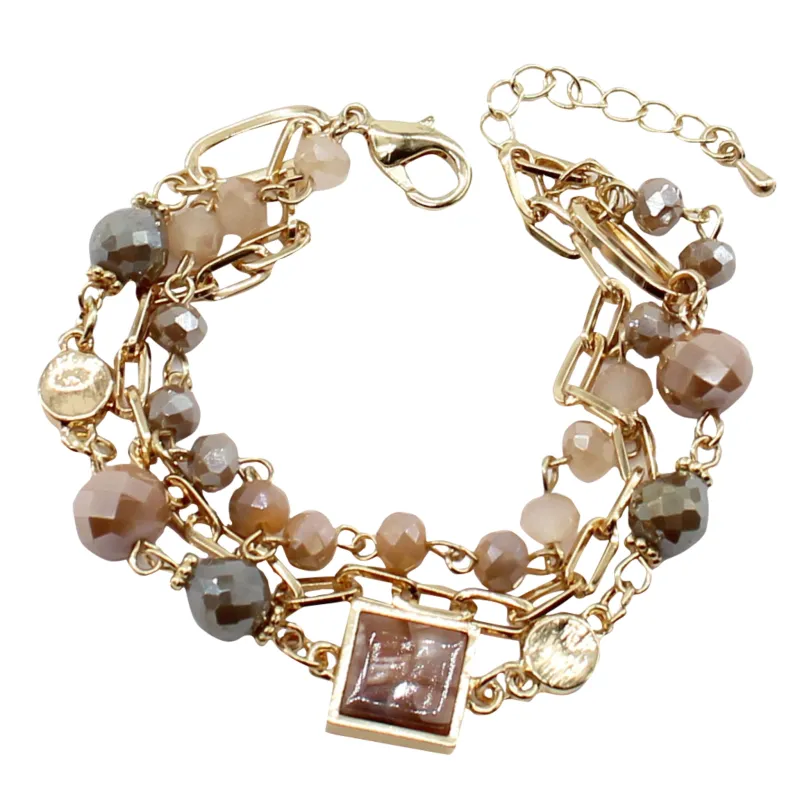 3 Strand Black, Champagne, Gold Beaded Link Bracelet with Black, Natural Resin Square sold by Charming Charlie