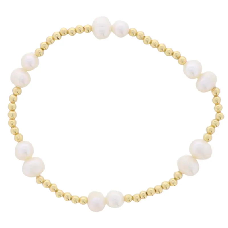 18K Gold Plated Gold Beaded 2 Pearl Pattern Stretch Bracelet sold by Charming Charlie