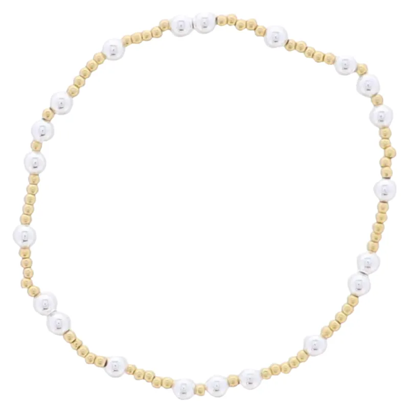 18K Gold Plated Gold, Silver Beaded 2 Silver Pattern Stretch Bracelet sold by Charming Charlie