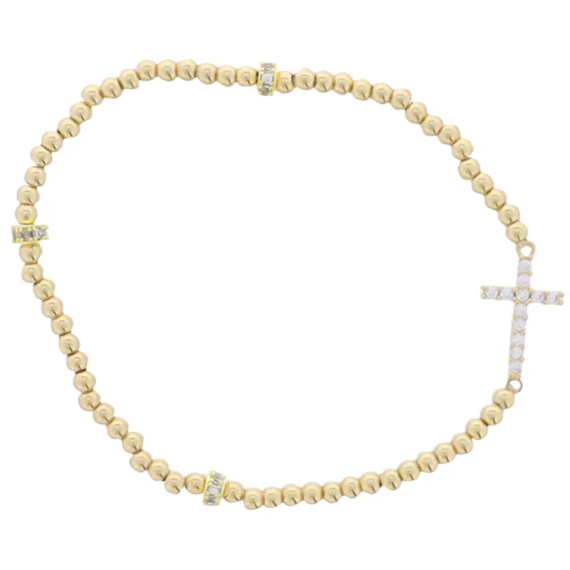 18K Gold Plated Gold Beaded Stretch Bracelet with Clear Crystal Cross sold by Charming Charlie