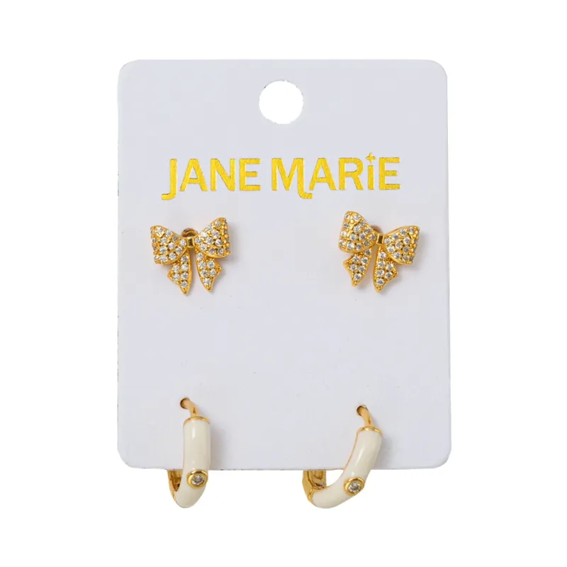 18K Gold Plated Set of 2, Crystal Bow with White Enamel Huggie Earring sold by Charming Charlie
