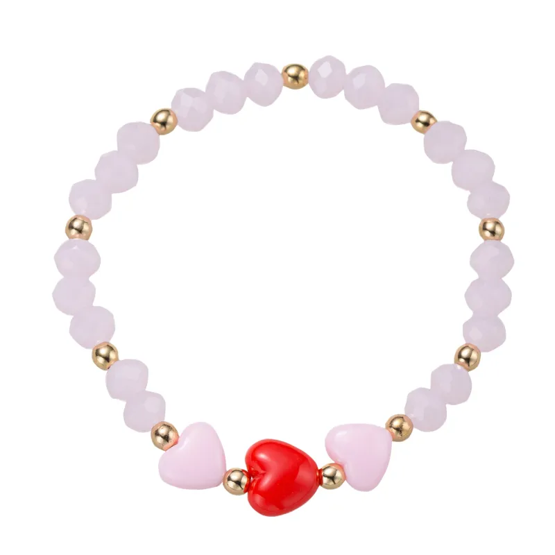Light Pink, Red Faceted Beaded Stretch Bracelet with Red, Pink Hearts sold by Charming Charlie