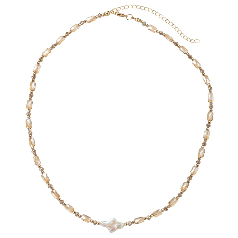 Champagne, Greige, Gold Beaded Necklace with Pearl Cross sold by Charming Charlie