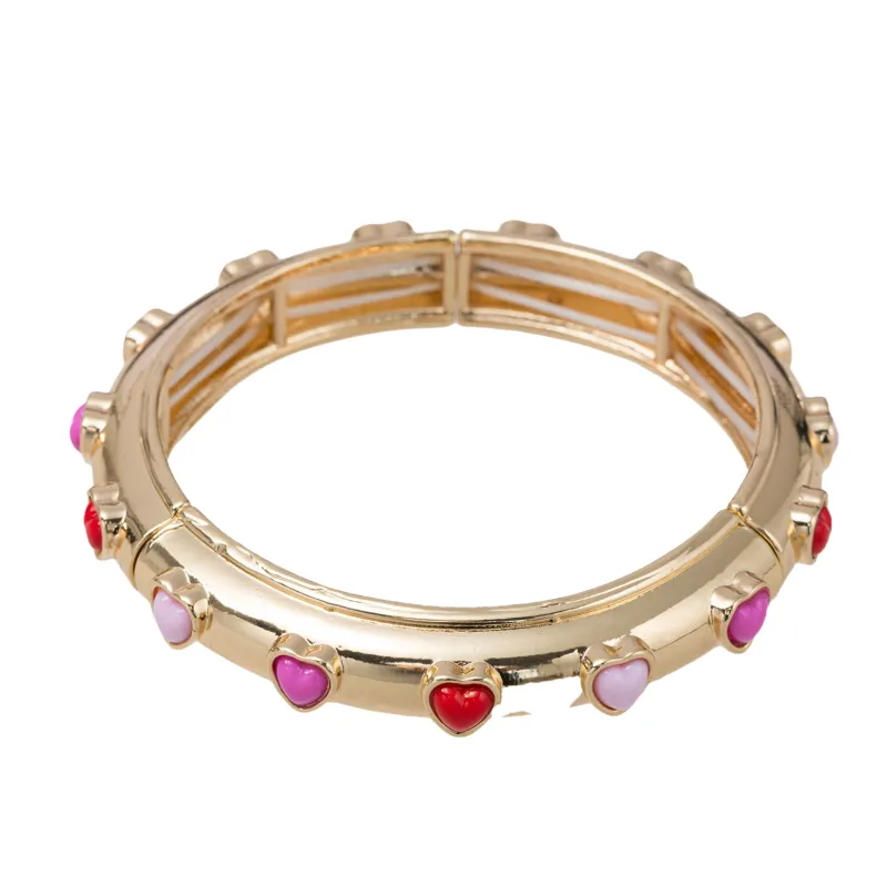 Gold Bangle Bracelet with Enamel Hearts sold by Charming Charlie