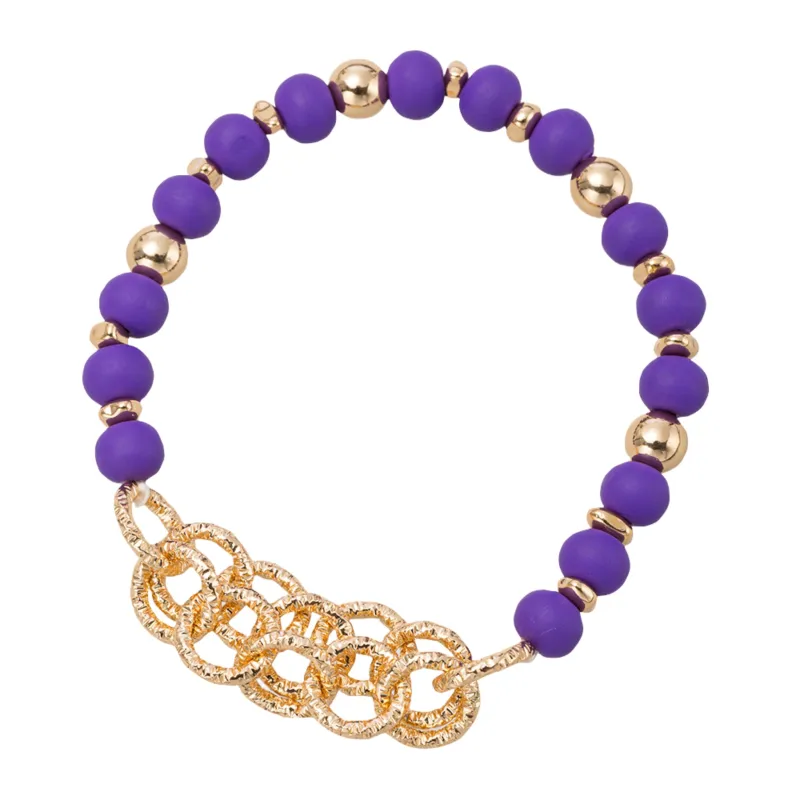 Purple, Gold Rubber Ball Beaded Stretch Bracelet with Gold Circle Chain sold by Charming Charlie