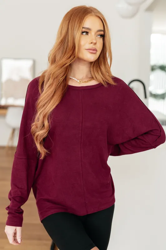 Drive Downtown Dolman Sleeve Top in Wine made by Charming Charlie