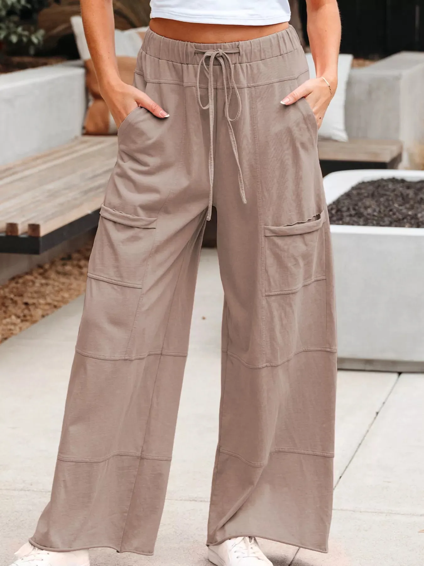 Mineral Wash Exposed Seam Drawstring Elastic Waistband Wide Leg Cargo Pants sold by Charming Charlie