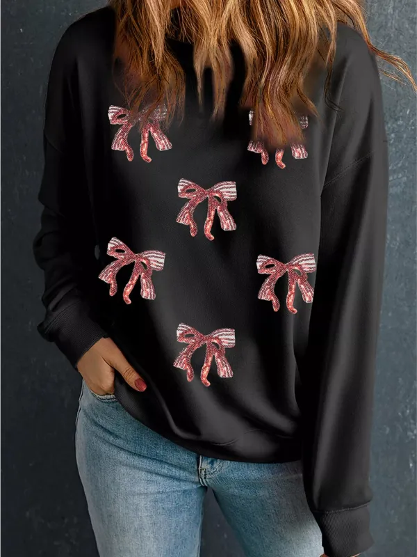 Christmas Sequin Ribbon Bow Drop Shoulder Sweatshirt sold by Charming Charlie