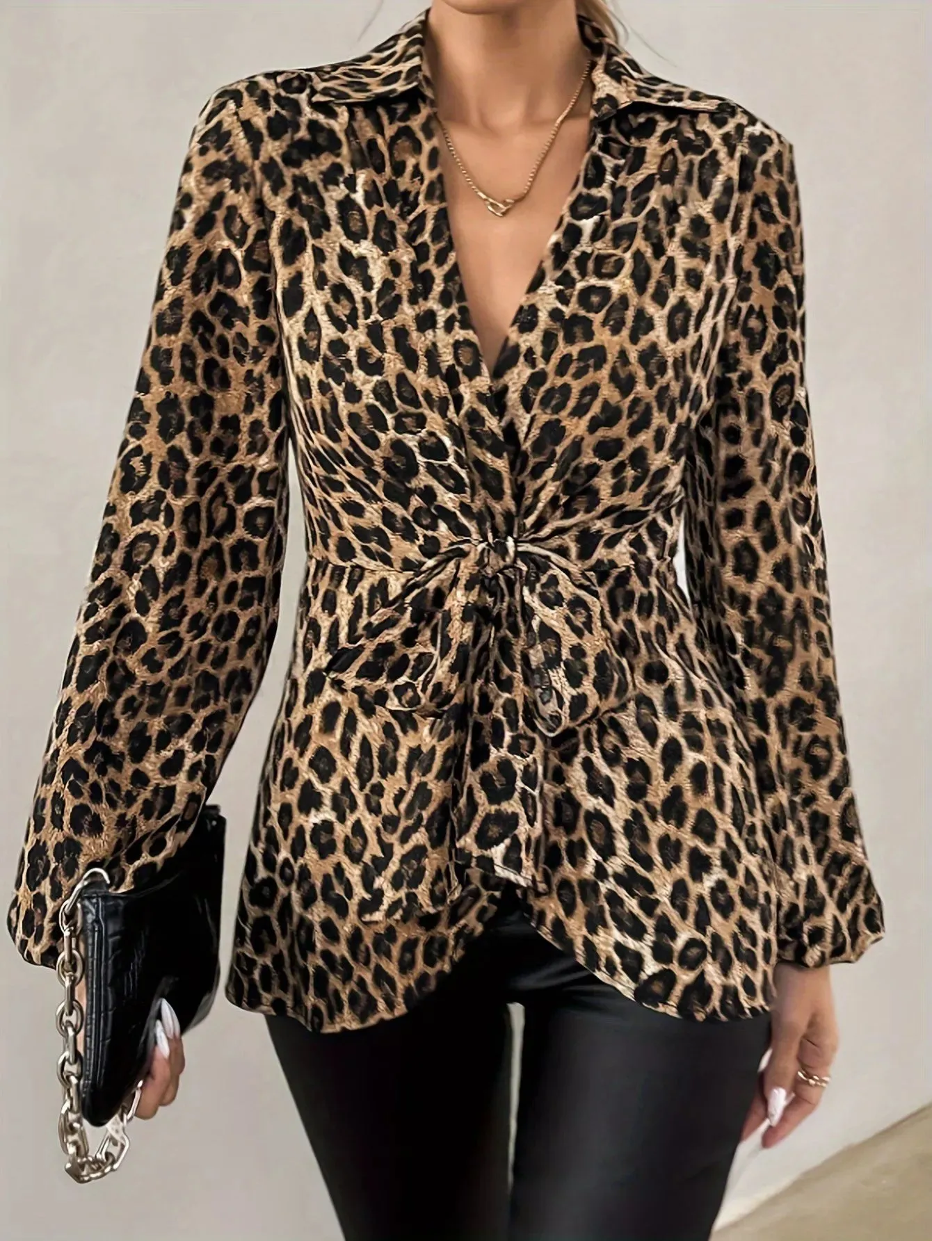 Leopard Print Tie Front Long Sleeve Blouse sold by Charming Charlie